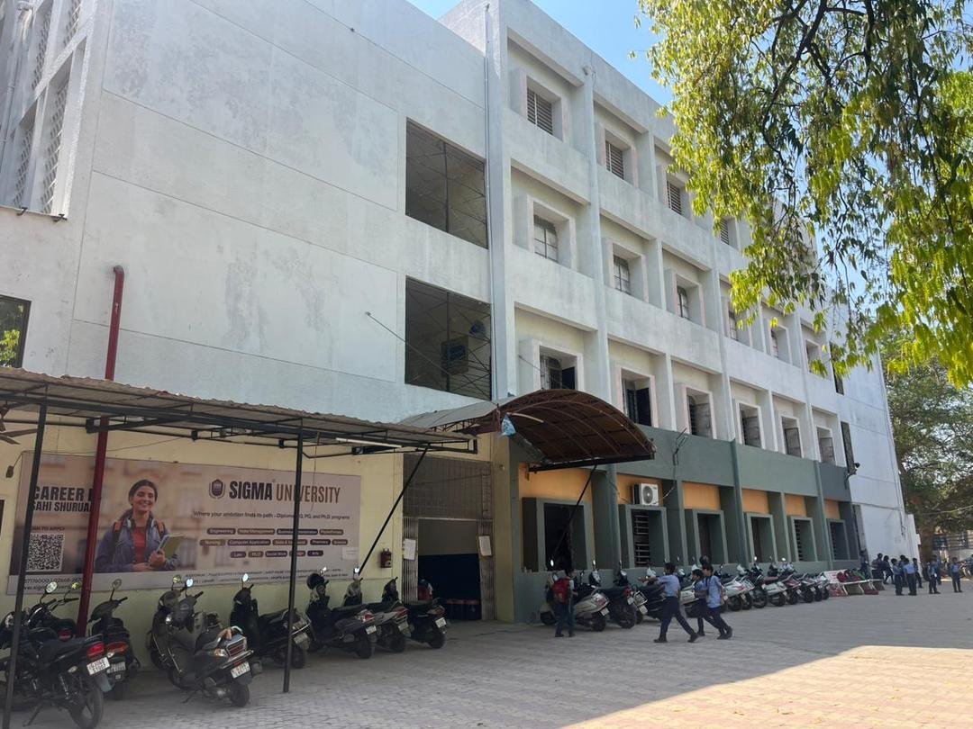 School building with admission banner