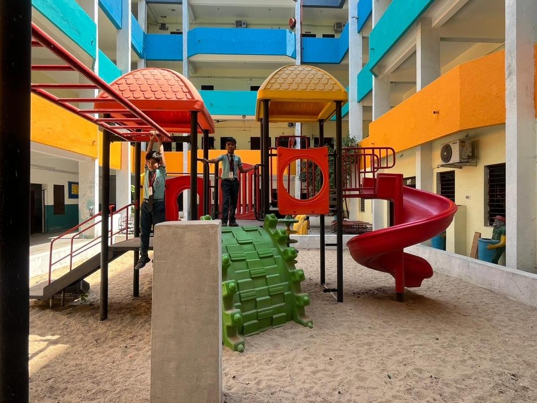 Colourful kindergarten playground with slides