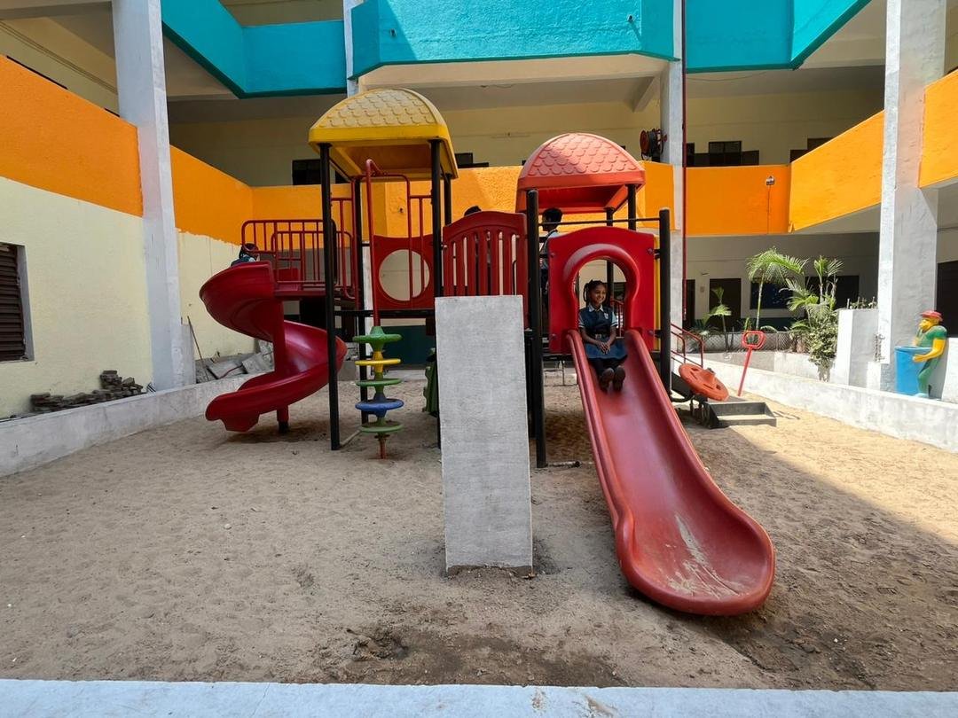 Girl coming down the slide