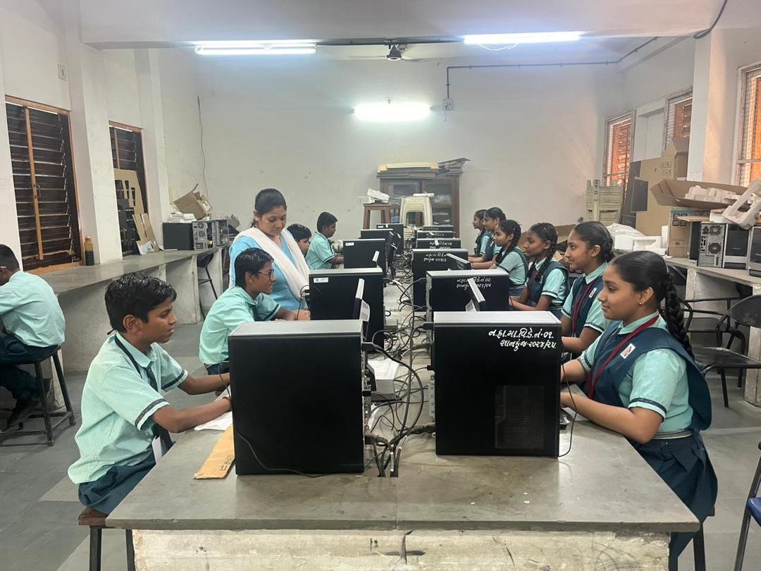 Girls working in the computer lab